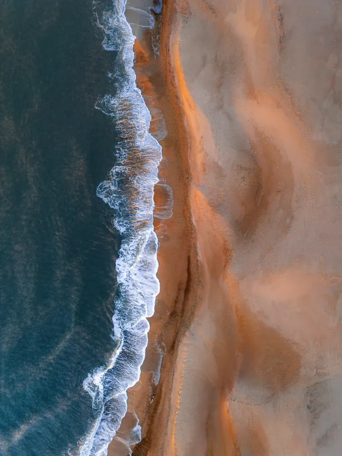 Aerial view of a Caribbean coastline — the Caribbean spans over 700 islands across 1.6 million square miles of ocean